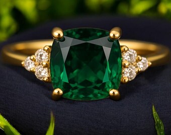 Lab Emerald Ring: Gold Plated Band with Diamond Accents