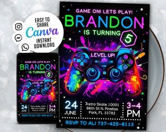May include: A neon green, pink, and blue birthday party invitation with a black background. The invitation features a video game controller with the text "GAME ON! LETS PLAY! BRANDON IS TURNING 5" and "LEVEL UP!" in a neon green font. The date and time of the party are listed as "24 JUNE 3-4 PM" and the RSVP information is "RSVP TO ALI 737-425-8113".