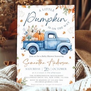 May include: A rectangular baby shower invitation card featuring a watercolour illustration of a light blue pickup truck carrying orange and white pumpkins. The text reads A LITTLE PUMPKIN IS ON THE WAY, Samantha Anderson, Saturday 26 October.