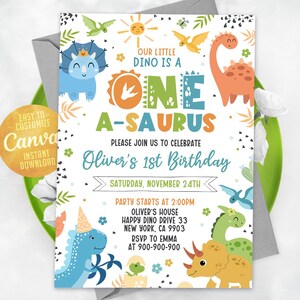 May include: A colorful dinosaur-themed first birthday party invitation with a blue, green, and orange dinosaur illustration. The text reads "Our little dino is a one-a-saurus. Please join us to celebrate Oliver's 1st Birthday. Saturday, November 24th. Party starts at 2:00 PM. Oliver's House, Happy Dino Drive 33, New York, CA 9903. RSVP to Emma at 900-900-900."