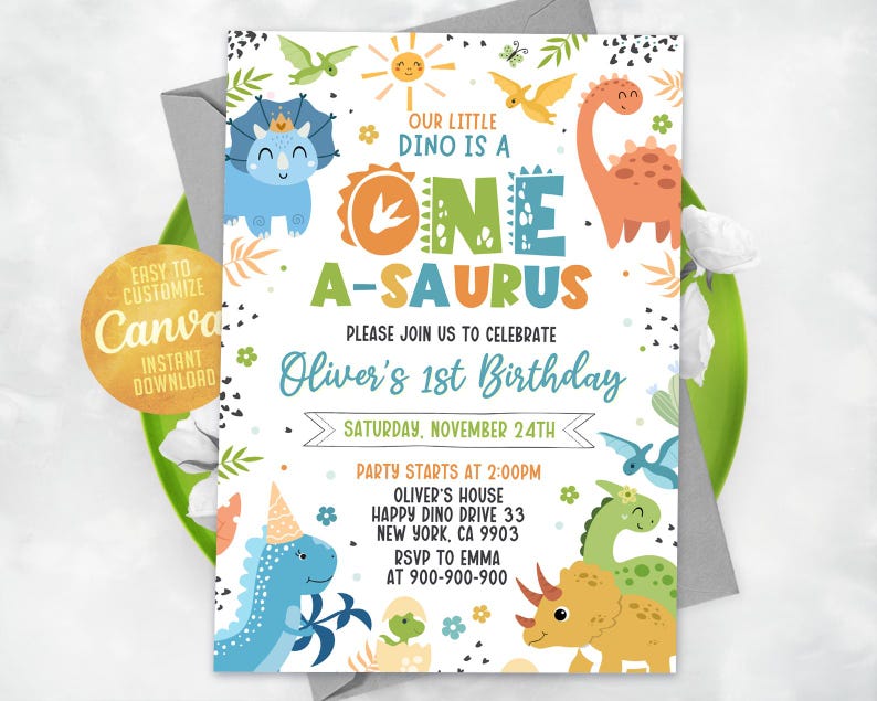May include: A colorful dinosaur-themed first birthday party invitation with a blue, green, and orange dinosaur illustration. The text reads "Our little dino is a one-a-saurus. Please join us to celebrate Oliver's 1st Birthday. Saturday, November 24th. Party starts at 2:00 PM. Oliver's House, Happy Dino Drive 33, New York, CA 9903. RSVP to Emma at 900-900-900."