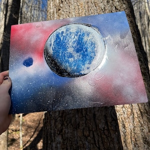 Red and blue galaxy spray paint art