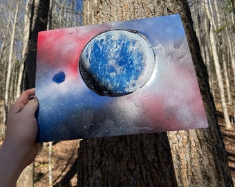 Peinture en aérosol galaxie rouge et bleue