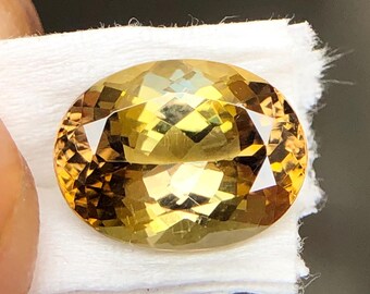 天然の希少なゴールデンイエロータンザナイト、9 x 5 MMオーバル本物の