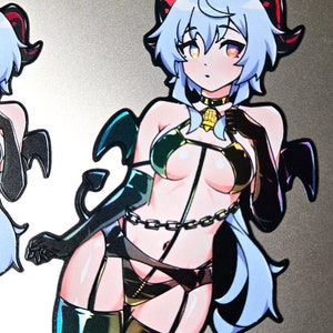 May include: A sticker featuring a cartoon character with blue hair, red horns, and a black and gold outfit. The character is wearing a chain and has a devil tail. The sticker has a holographic finish.
