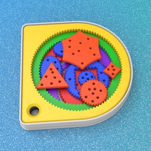 May include: A yellow and white plastic toy with a variety of colourful interlocking gears. The gears are red, blue, green, and purple. The toy is shaped like a rounded rectangle.