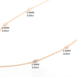 May include: A delicate rose gold necklace with several small, round diamonds evenly spaced along the chain. The diamonds are 2.0mm and 2.8mm in size. Text indicates the carat weight of each diamond.