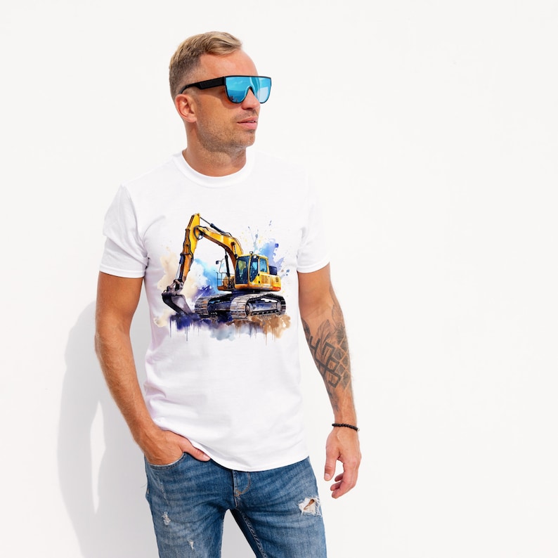 May include: White t-shirt with a watercolour image of a yellow excavator. The excavator has a black bucket and is set against blue and brown paint splatters. The shirt is worn by a person wearing blue sunglasses.
