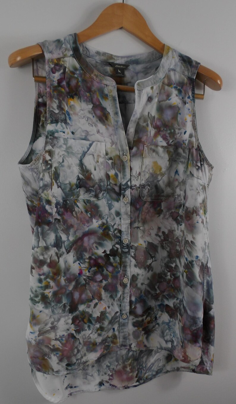 May include: A rustic wooden sign with the text "Welcome to our home" in white lettering. The sign features a distressed finish and a simple, inviting design, perfect for front door decor.