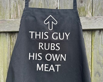 This guy rubs his own meat men’s black apron