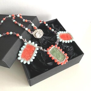 Handmade charm necklace comes in a black gift box and is ready for gift giving.