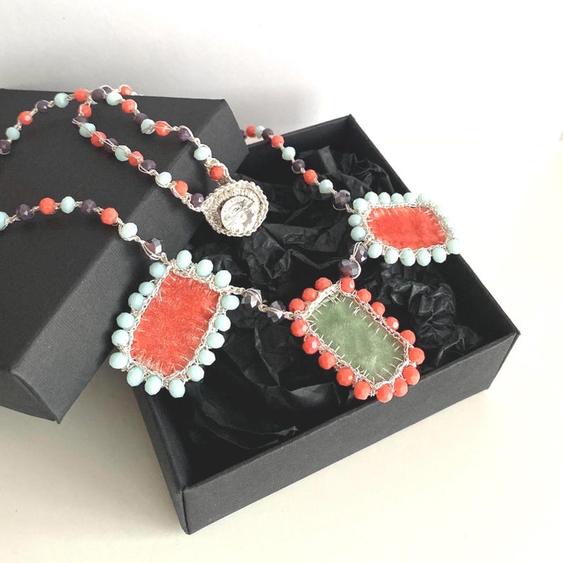 Handmade charm necklace comes in a black gift box and is ready for gift giving.