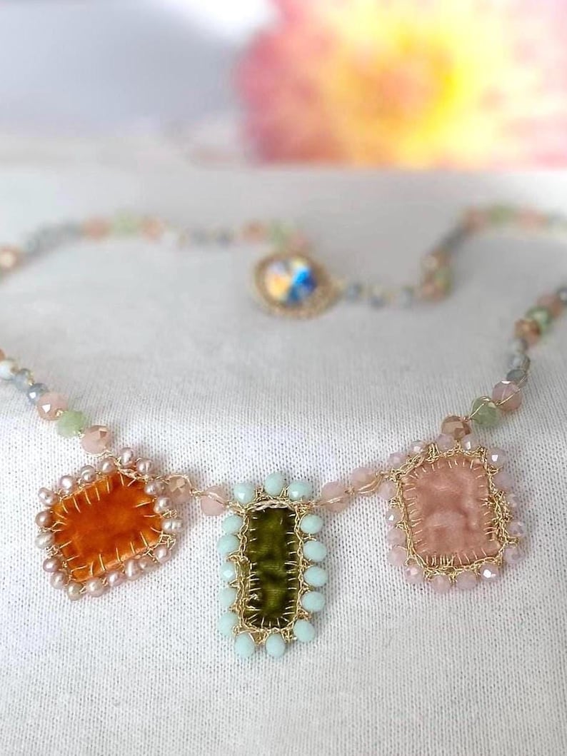 3 handmade charms add uniqueness and exclusivity to the necklace. 3 charms made of orange, green and cream velvet.