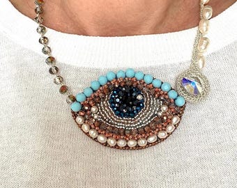 Collar con diseño de ojo turco: gargantilla con cuentas en forma de ojo, joyería artesanal con cuentas y perlas.
