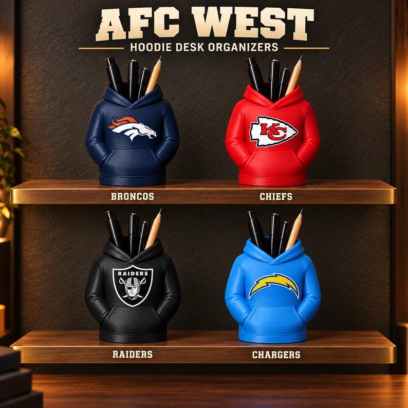 May include: Four desk organizers shaped like miniature hoodies, each featuring an AFC West team logo: Broncos in navy, Chiefs in red, Raiders in black, and Chargers in blue. Each organizer holds several black pens and a wooden pencil.