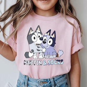 Blue Dog Muffin & Socks Shirt – Fun Cartoon Dog Siblings Tee – Kids Summer Outfit – Playful Matching Characters Shirt