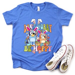 Don't Worry Be Hoppy Easter Shirt, Cartoon Dog Easter Tee, Blue Dog T-Shirt, Easter Kids Gift, Bunny Shirt, Bunny And Eggs, Happy Easter Day