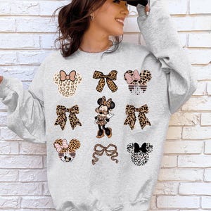 Cute Minnie Mouse Leopard Coquette Bow Sweatshirt, Disney Girls Sweater, Minnie Mouse Bow Hoodie, Disneyland Girls Trip Magic Kingdom Park image 1