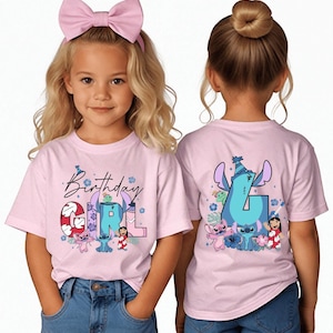 May include: Pink short-sleeved t-shirt with the text "Birthday Girl" and cartoon characters. The front of the shirt has the text "GIRL" with cartoon characters. The back of the shirt has the number "4" with cartoon characters.