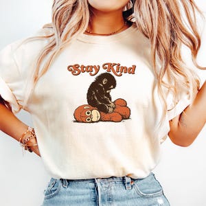 May include: A rustic wooden sign with the text "Welcome to our porch" in white lettering. The sign features a distressed finish and a simple, inviting design, perfect for outdoor decor.