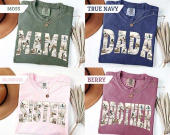 May include: Four short-sleeved crew neck t-shirts in moss green, true navy, blossom pink, and berry red. Each shirt features a large block-letter graphic on the chest displaying the words MAMA, DADA, SISTER, or BROTHER filled with a duck pond scene.