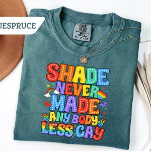 Comfort Colors® Shade Never Made Anybody Less Gay Shirt, Unisex Rainbow Shirt, Gaylor Shirt, Pride Parade Shirt, You Need To Calm Down Shirt