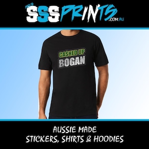 May include: Black t-shirt with a green and white graphic that says "CASHED UP BOGAN". The shirt is made in Australia and is available in stickers, shirts, and hoodies.