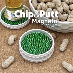 May include: White ceramic coasters with green spikes and a matching bowl. The bowl and coasters have the text "Chip & Putt Magneto Coasters & Bowl" printed on them.