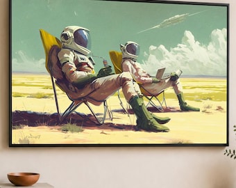 May include: A framed wall art print depicting two astronauts in white space suits sitting in yellow folding chairs on a desert landscape. One astronaut holds a drink, the other uses a laptop. A spacecraft flies in the pale green sky above.