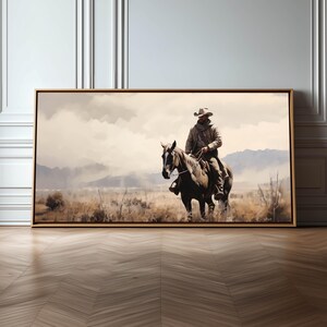 Wydruk na płótnie z kowbojem: dekoracja ścienna w stylu vintage z krajobrazem westernu