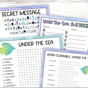May include: A set of four educational activity sheets with an Under the Sea theme, featuring a Secret Message cipher, an A-Z Race, a word search with a fish illustration, and a word scramble, all printed on white paper with light blue watercolor borders.