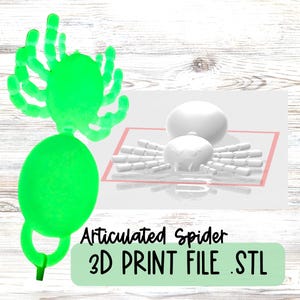 Könnte beinhalten: Eine grüne, bewegliche Spinnen-3D-Druckdatei. Die Datei ist für einen 3D-Drucker und im STL-Format. Das Bild zeigt ein 3D-gedrucktes Modell der Spinne.