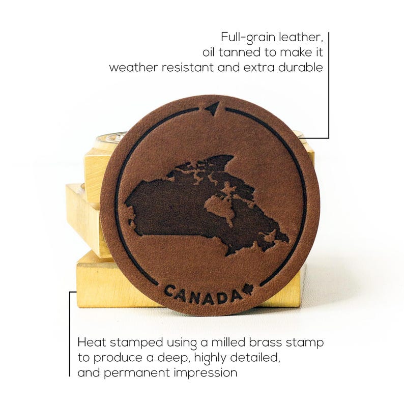 May include: Brown leather patch featuring a map of Canada with the word "CANADA" embossed in the centre. The patch is heat-stamped using a milled brass stamp to create a deep, detailed impression.