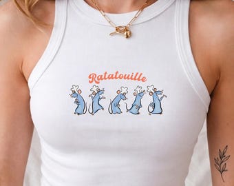 Camiseta sin mangas Ratatouille Doodle Crop Tank, Camiseta Remy Rat Baby Tee, Camiseta corta Magical Kingdom Epcot, Camiseta sin mangas Theme Park Showcase, Camiseta del Pabellón Francés