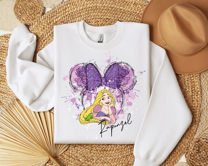 a white shirt with a picture of a princess on it