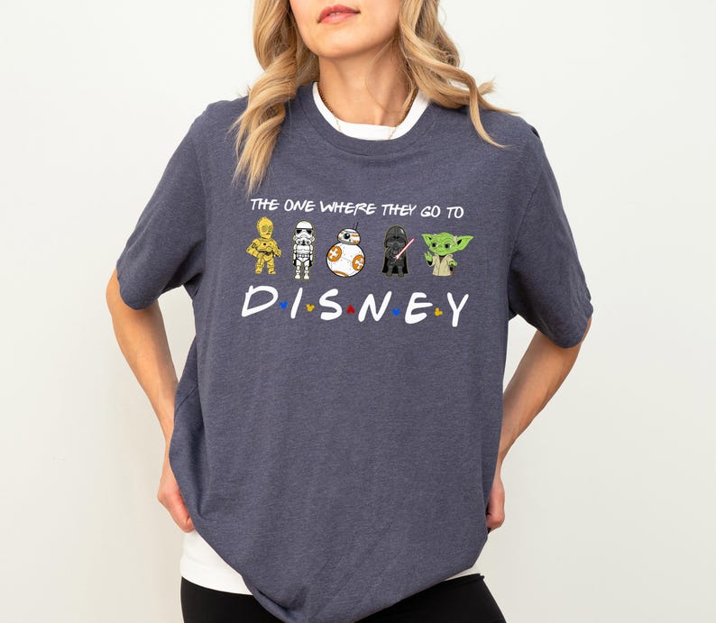 a woman wearing a t - shirt that says the one where they go to disney