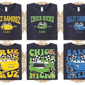 a set of four shirts with cars on them