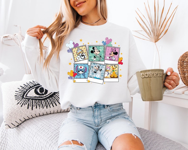 a woman sitting on a bed holding a cup of coffee