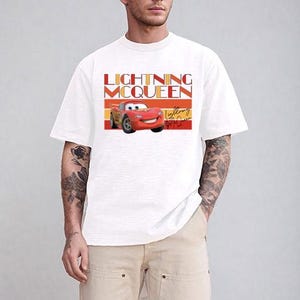 a man in a white shirt and khaki pants