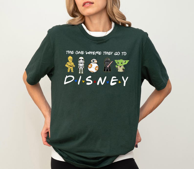 a woman wearing a t - shirt that says the one where they go to disney