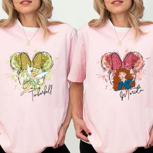 a couple of women standing next to each other