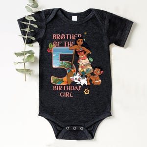 a baby bodysuit with the number five on it