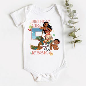 a baby bodysuit with a picture of a girl and a boy on it