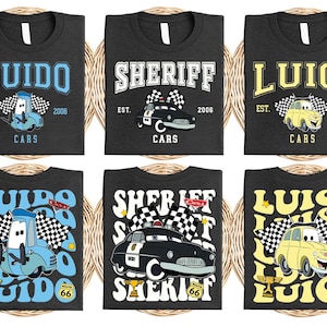 a group of four t - shirts with cars on them