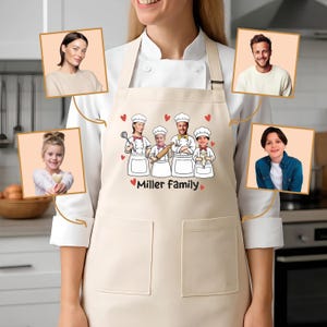 May include: A beige apron with a cartoon family illustration, each member wearing a chef's hat and holding cooking tools. The apron has two front pockets and the words "Miller Family" in red script.