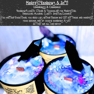 May include: Three candles with black lids and wooden wicks. The candles are filled with a blue and purple wax with embedded crystals. The text on the label reads "MANIFEST RAINBOWS & SH*T! LEMONGRASS & CHAMOMILE RAINBOW FLUORITE CITRINE & TOURMALINE FOR MANIFESTING ENERGIZING ALIGNING CLARITY SPIRITUAL GUIDANCE YOU MATTER!! EVERYTHING YOU NEED LIES WITHIN DREAM BIG! GET OUT THERE AND MANIFEST YOUR DREAMS AND OF COURSE RAINBOWS N SH*T SO THAT WE ALL CAN ENJOY"