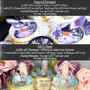 May include: Two glass jars filled with colorful crystals and wax. The jars are labeled "Awaken Dreamer" and "Earth Mama". The text on the jars reads "Awaken Dreamer. You are light. Your are love. You are consciousness."