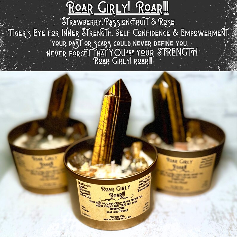 May include: Three brown glass candle jars with lids, each containing a tiger's eye crystal and a white candle. The jars are labeled "Roar Girly! Roar!" and have a quote about inner strength.