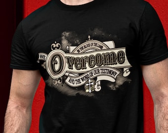 Bold, Vintage "We Overcome By the Blood of the Lamb" T-shirt. Great gift for him or gift for her. In sizes Small to plus size 6X