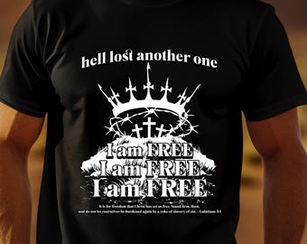 Hell Lost Another One, I AM FREE T-Shirt. Makes a great gift, in sizes small to plus sizes 5X, scripturebrandingco